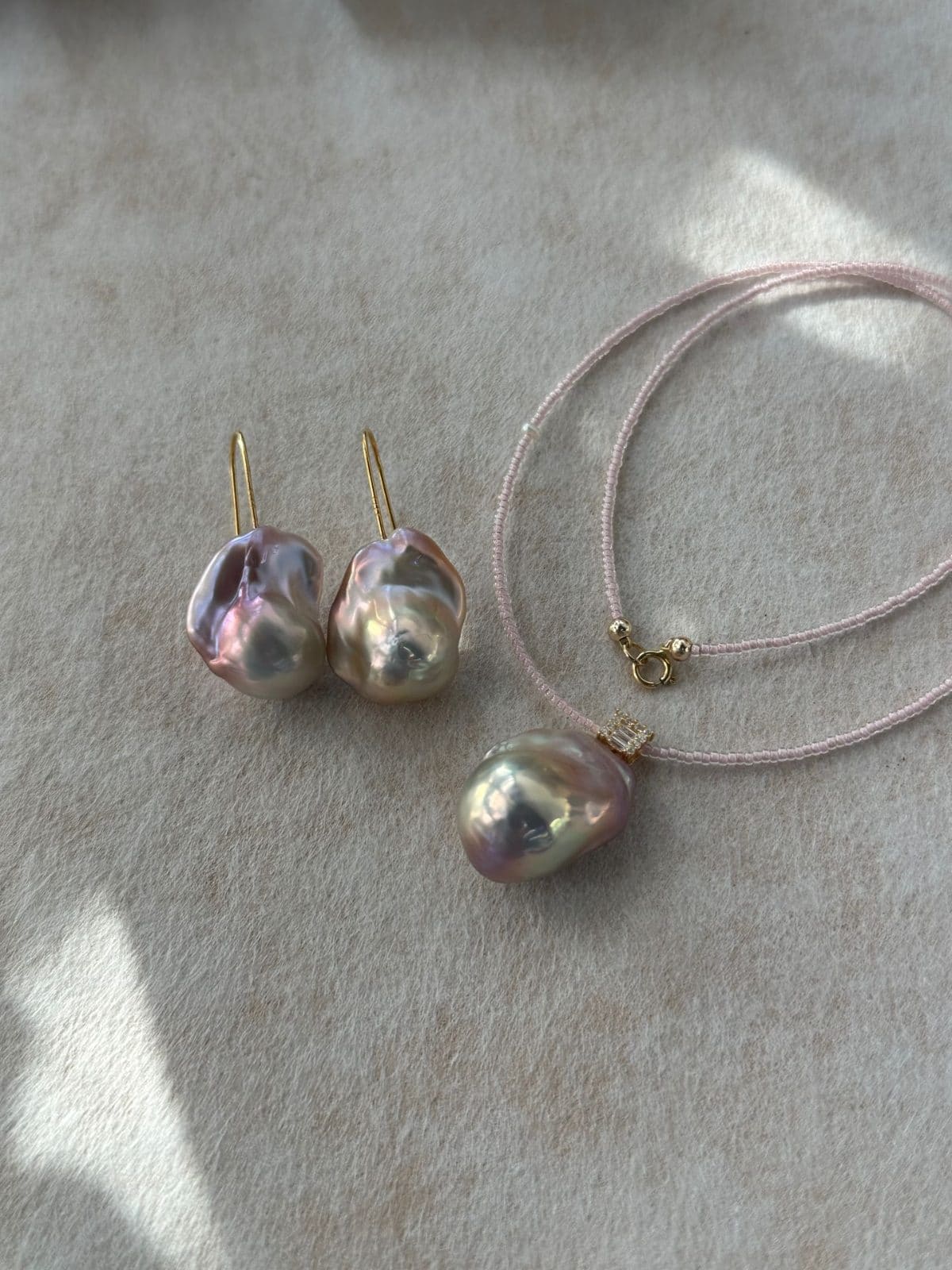 minimalist baroque pearl earrings — Top-Grade Iridescent Baroque Pearl Hook Earrings | PoetPearl handcrafted jewelry